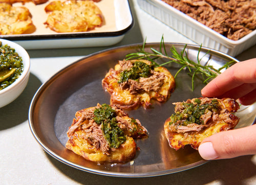 Crispy Squashed Potatoes with Herby Lamb & Mint Salsa Verde