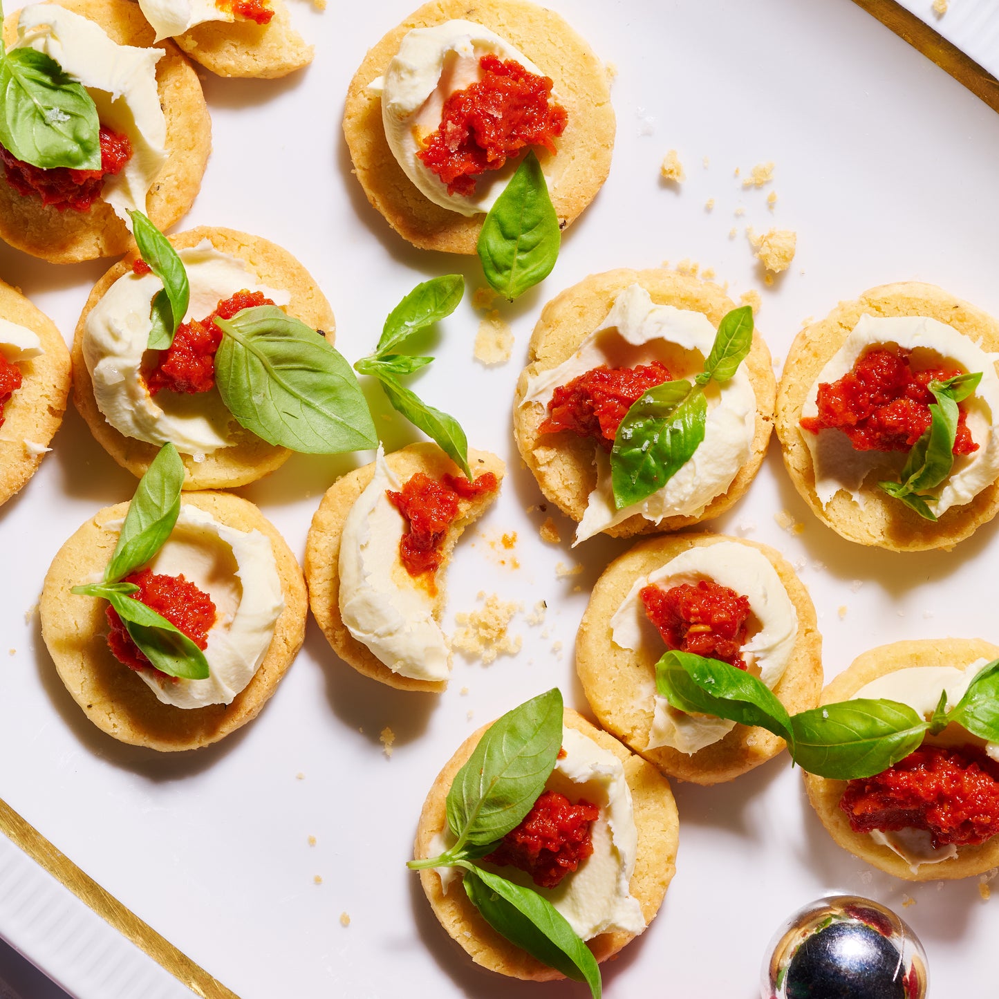 Bake-at-home parmesan biscuits with red capsicum tapenade and mascarpone