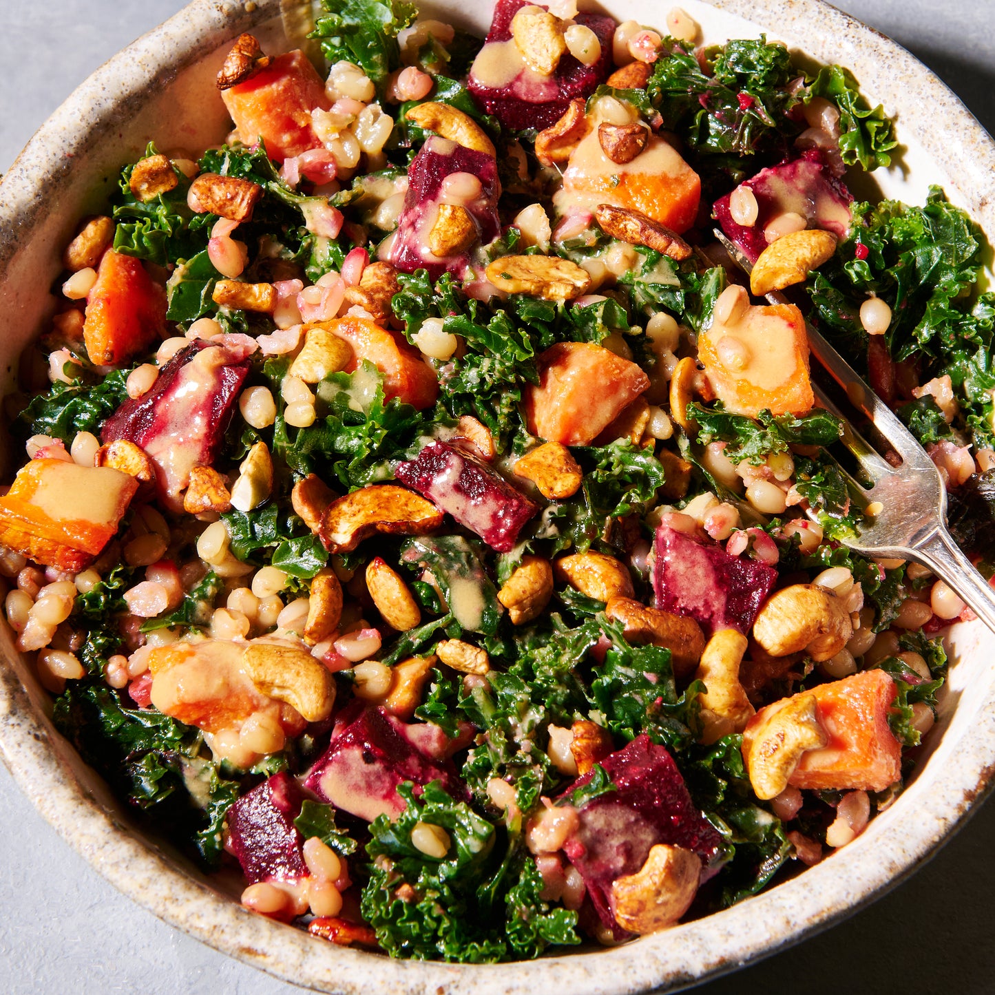 Roast vegetables with miso, cashews and freekeh