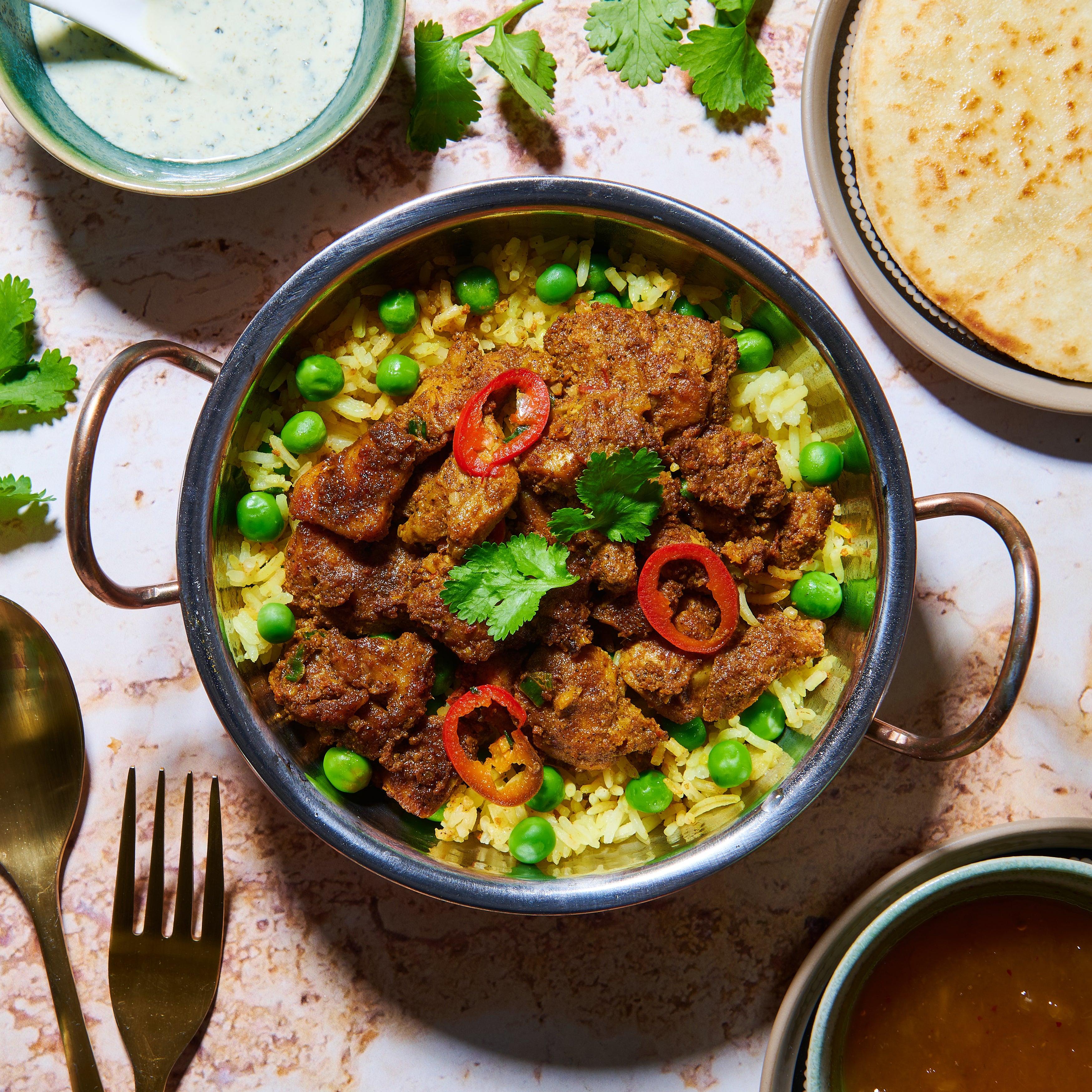 Tandoori chicken with saffron rice and naan bread
