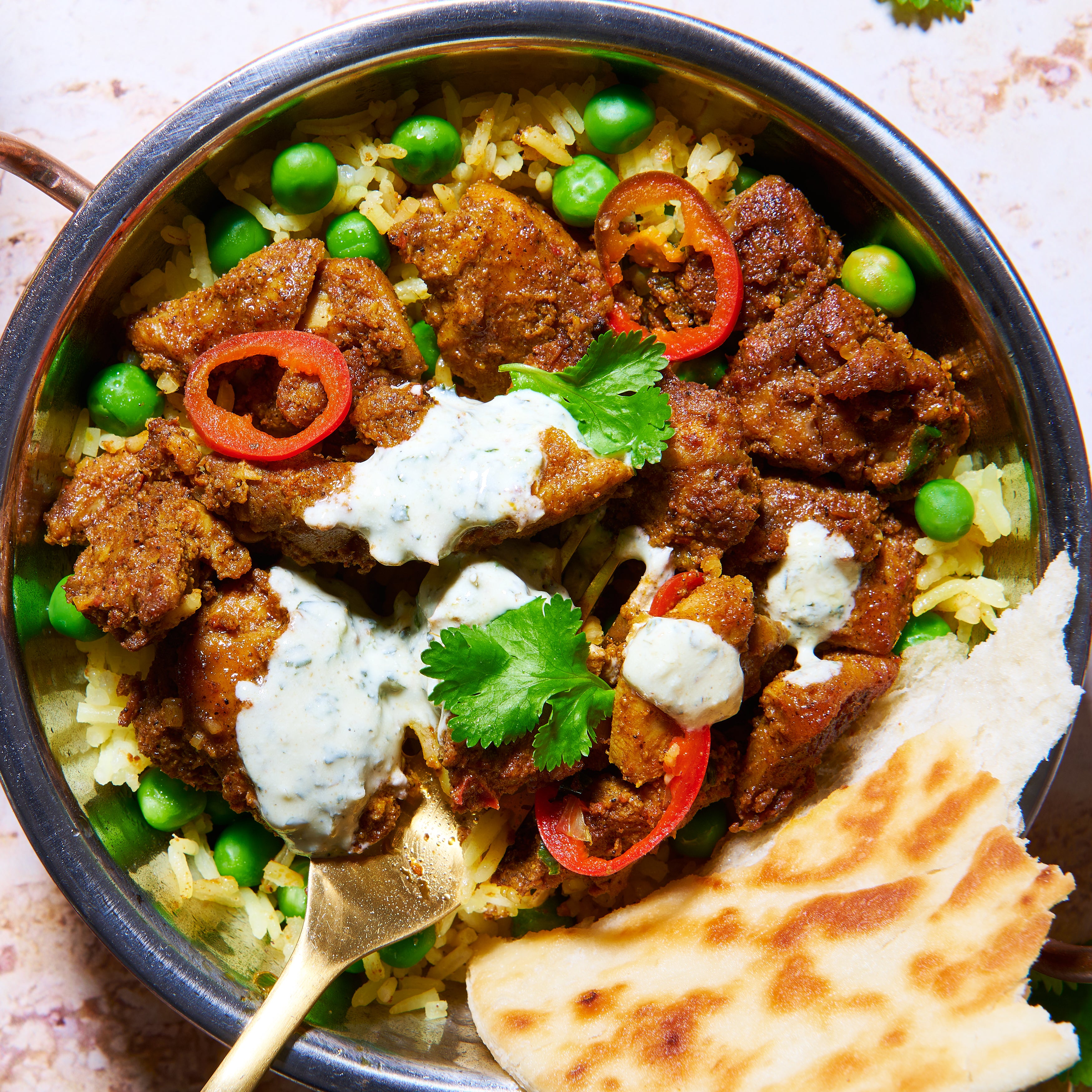 Tandoori chicken with saffron rice and naan bread