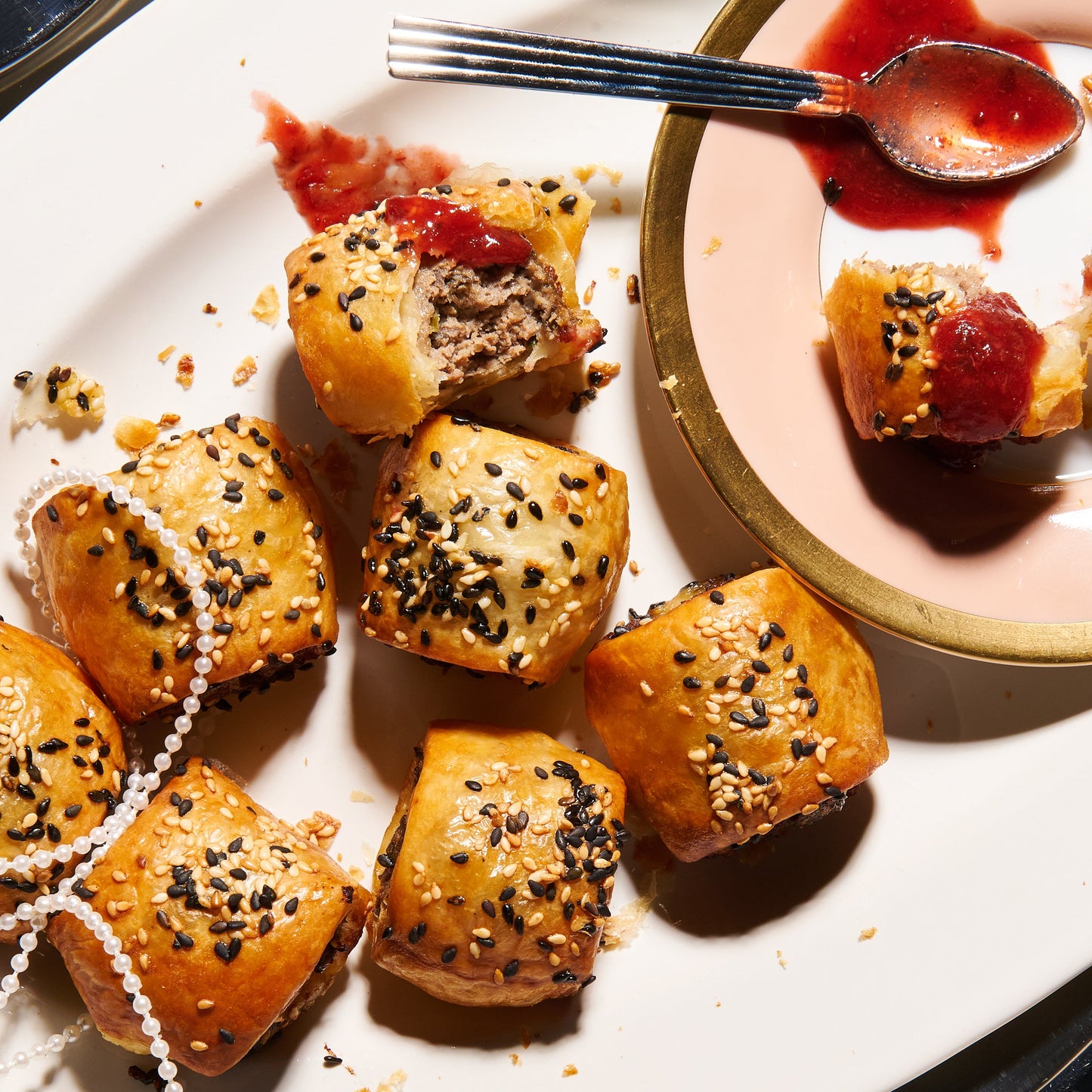 duck sausage rolls on a plate