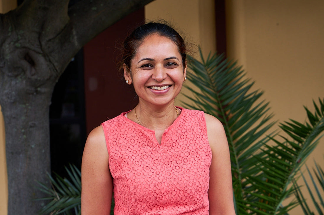 Mandeep, Dinner Ladies food technologist, smiling outdoors