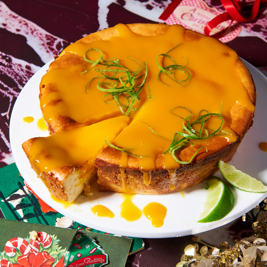 Bake-at-home coconut and lime cheesecake with mango coulis