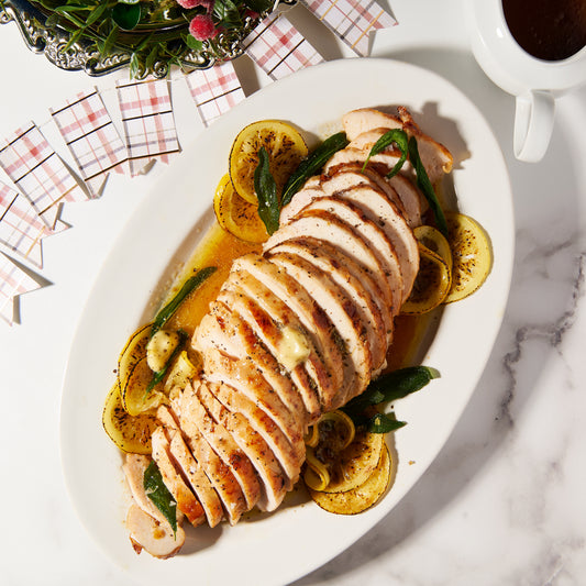 Sliced Citrus brined free range turkey breast with sage and honey butter 