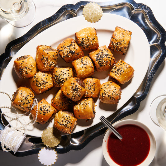 Duck sausage rolls with cherry and plum dipping sauce