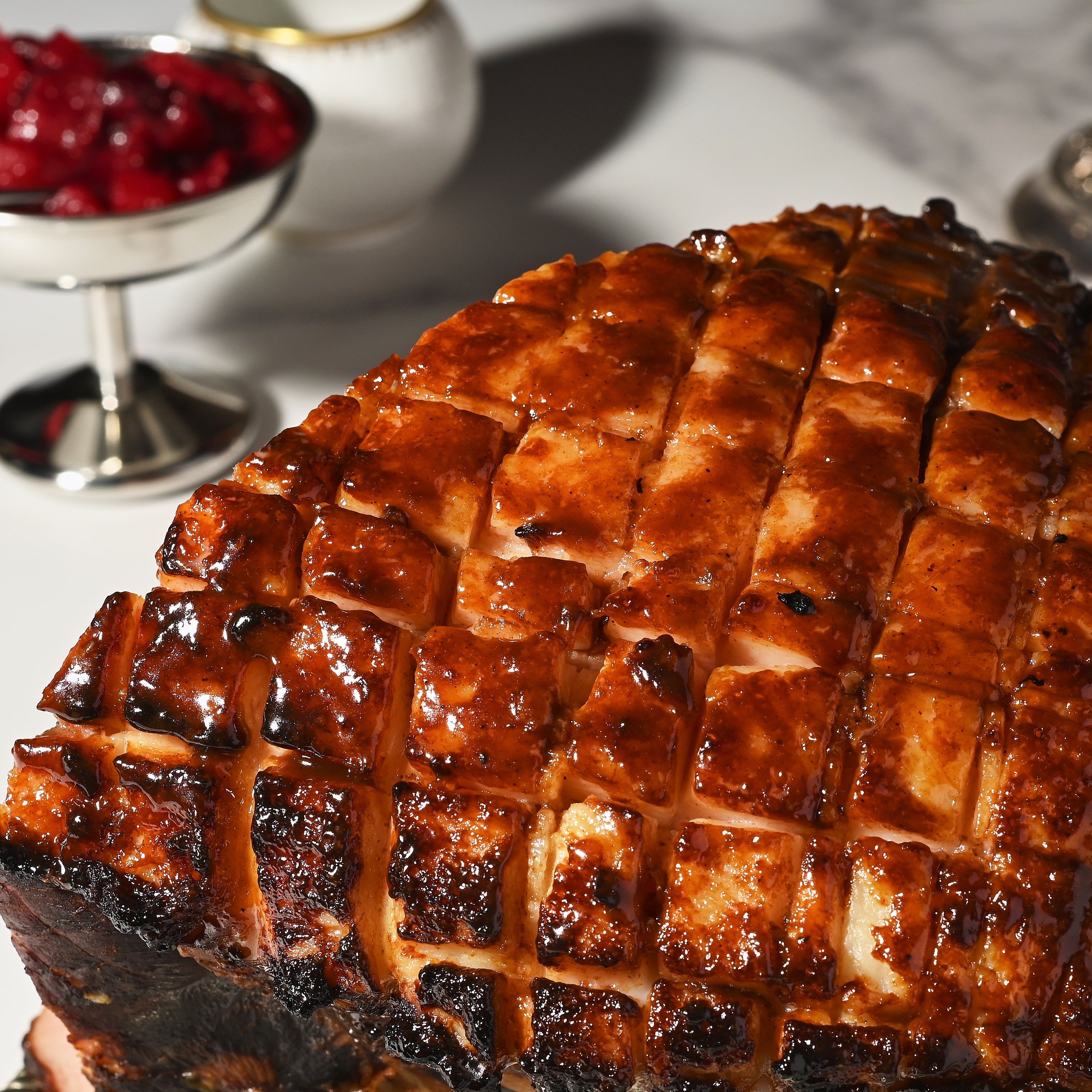 Free-range Christmas ham with spiced maple glaze-hock end macro
