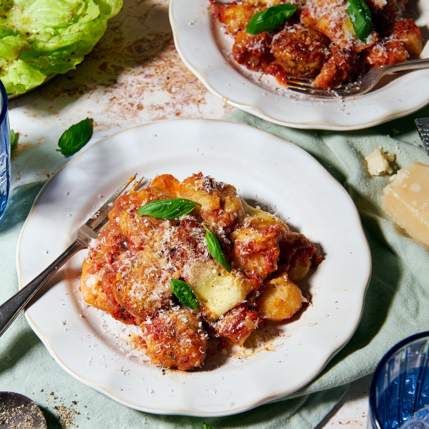 Gnocchi with chicken polpettine, tomato and bocconcini on plates