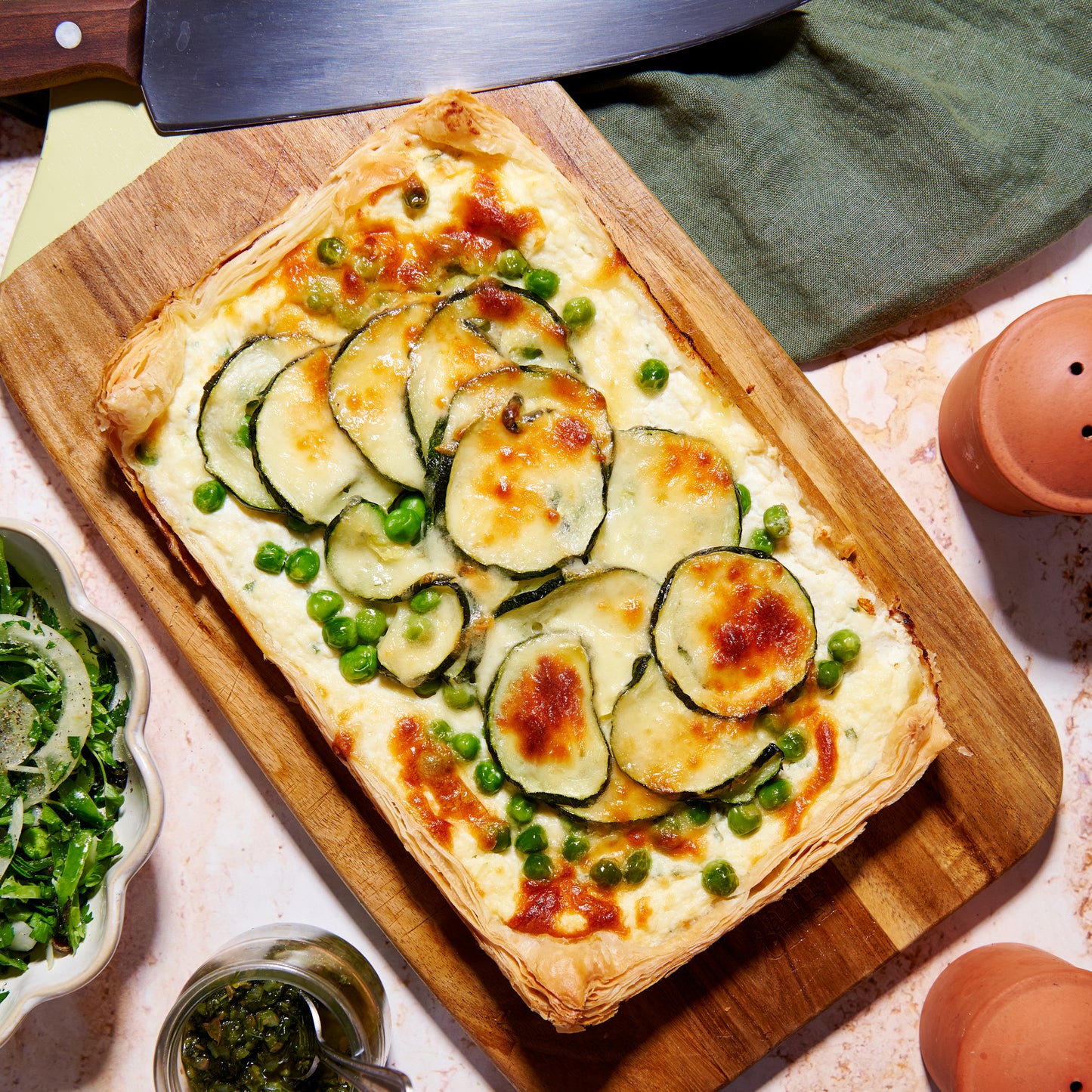 Pea, zucchini and ricotta tart with mint salsa