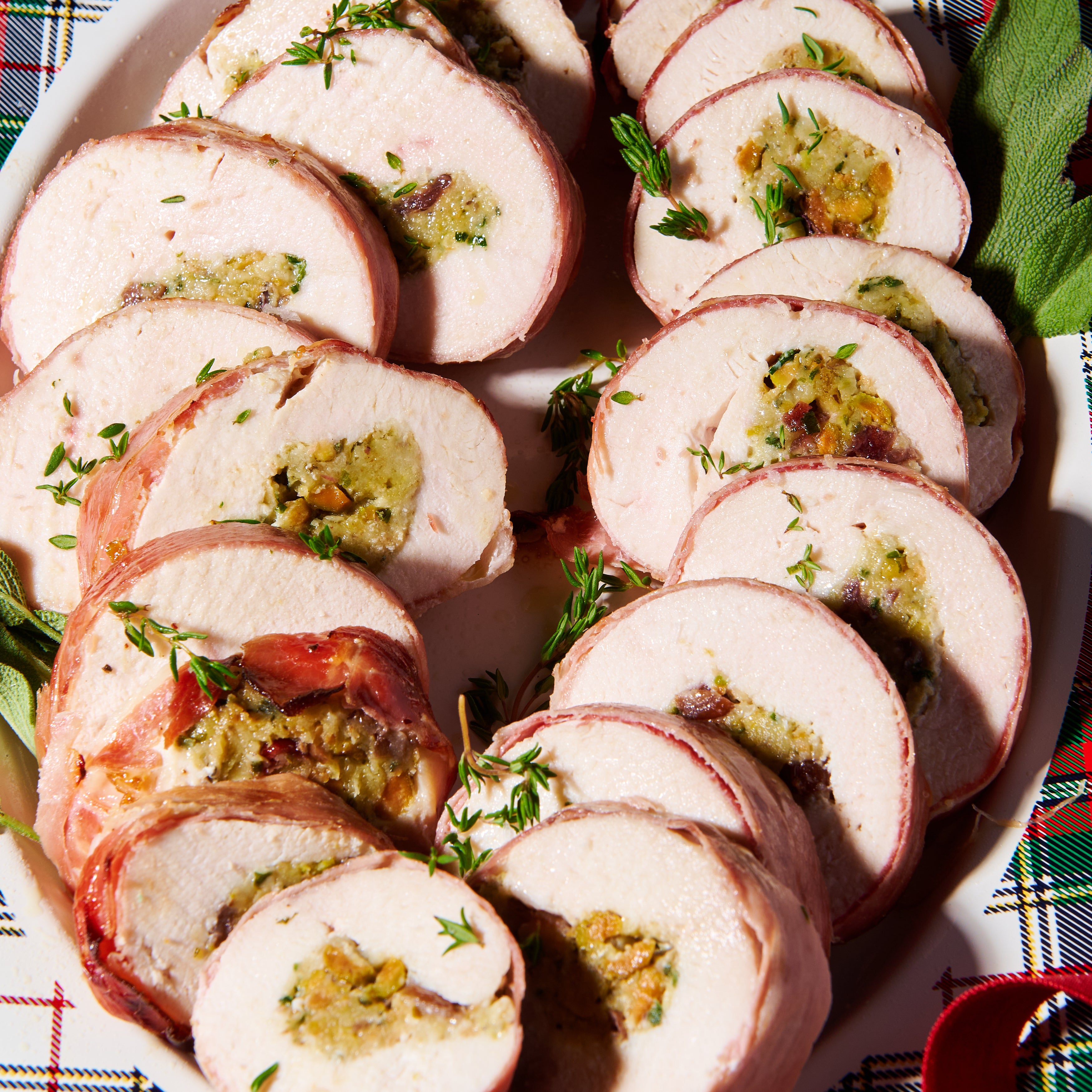Prosciutto wrapped chicken, cranberry and pistachio ballotine macro