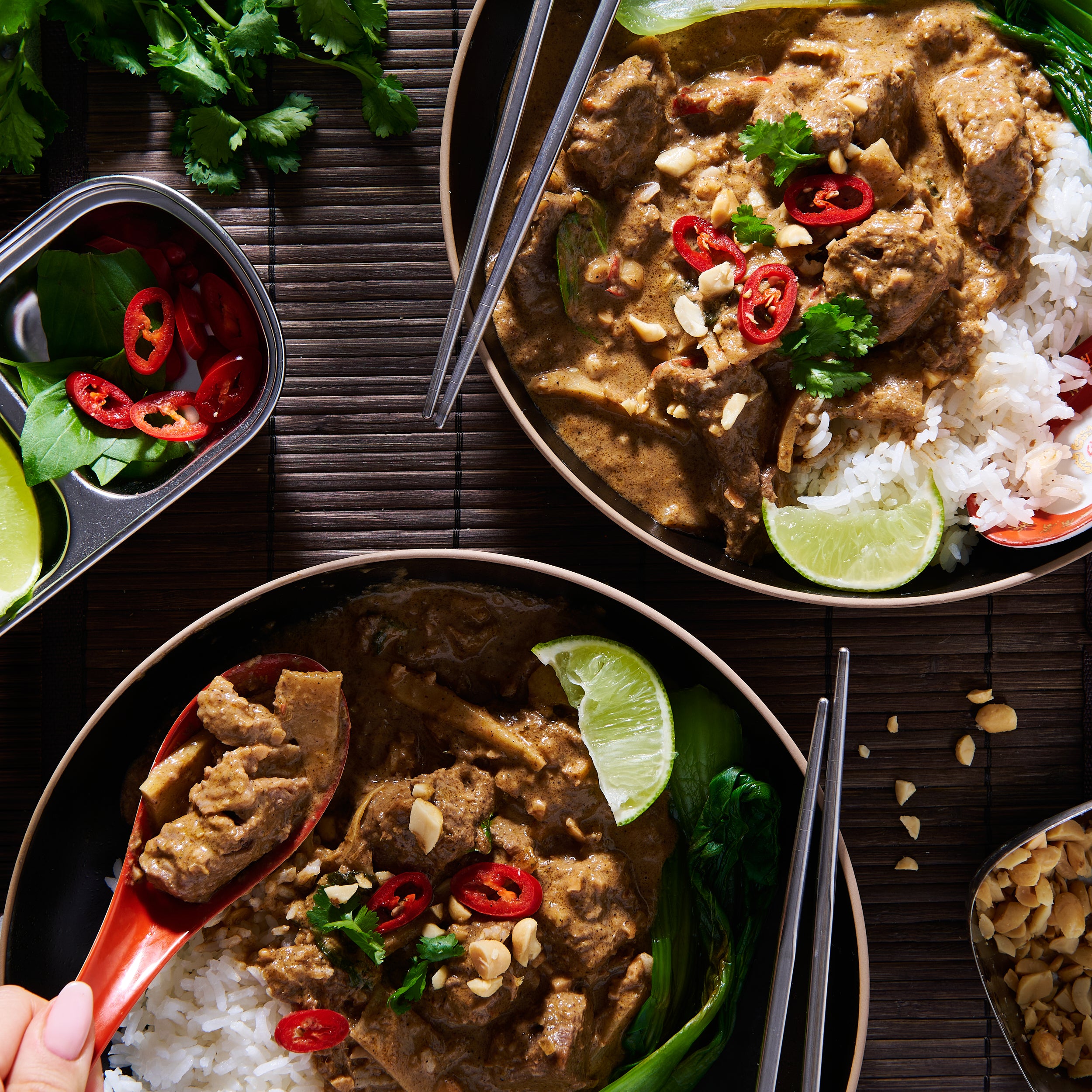 Two bowls of beef red curry
with rice
