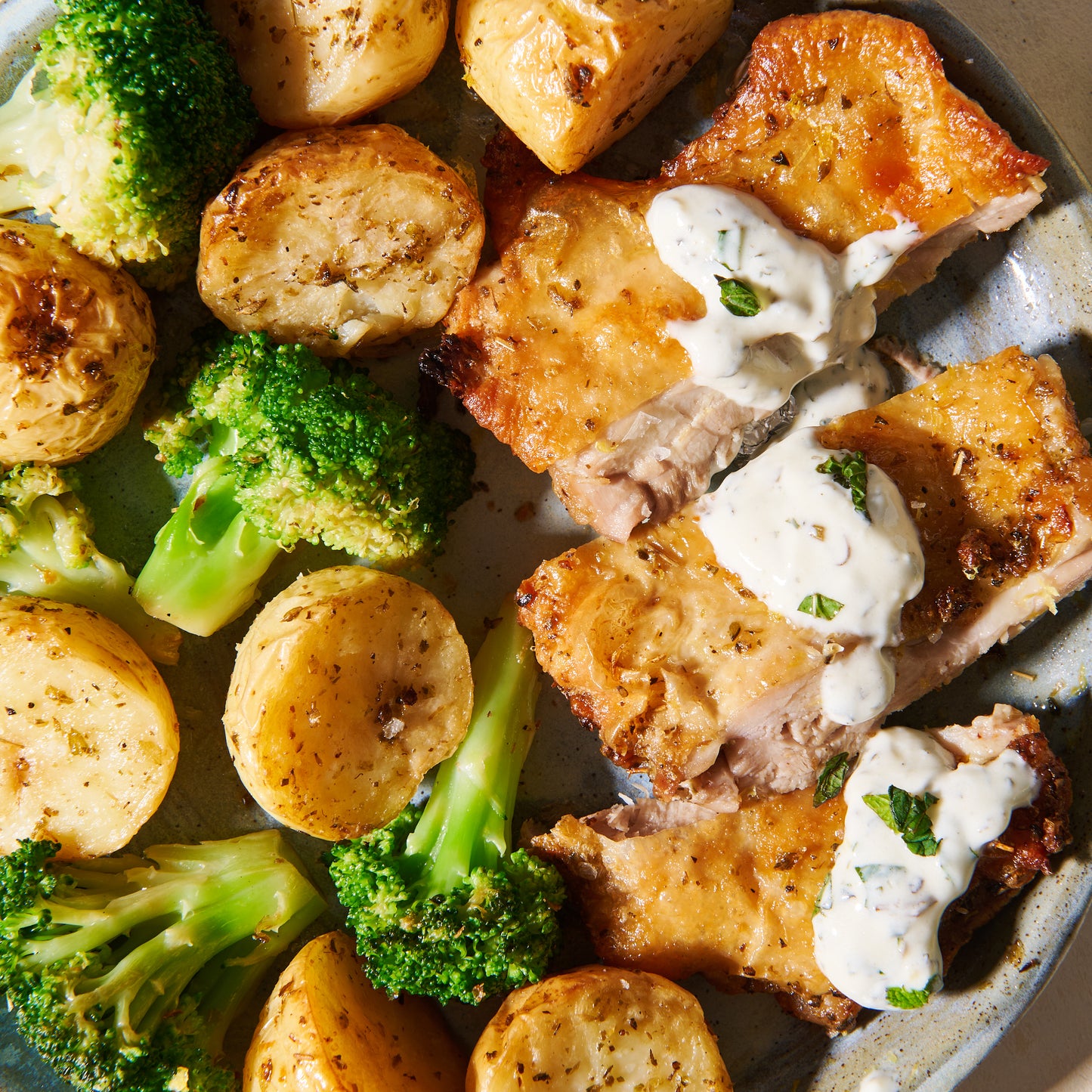 Greek lemon chicken with roast baby potatoes