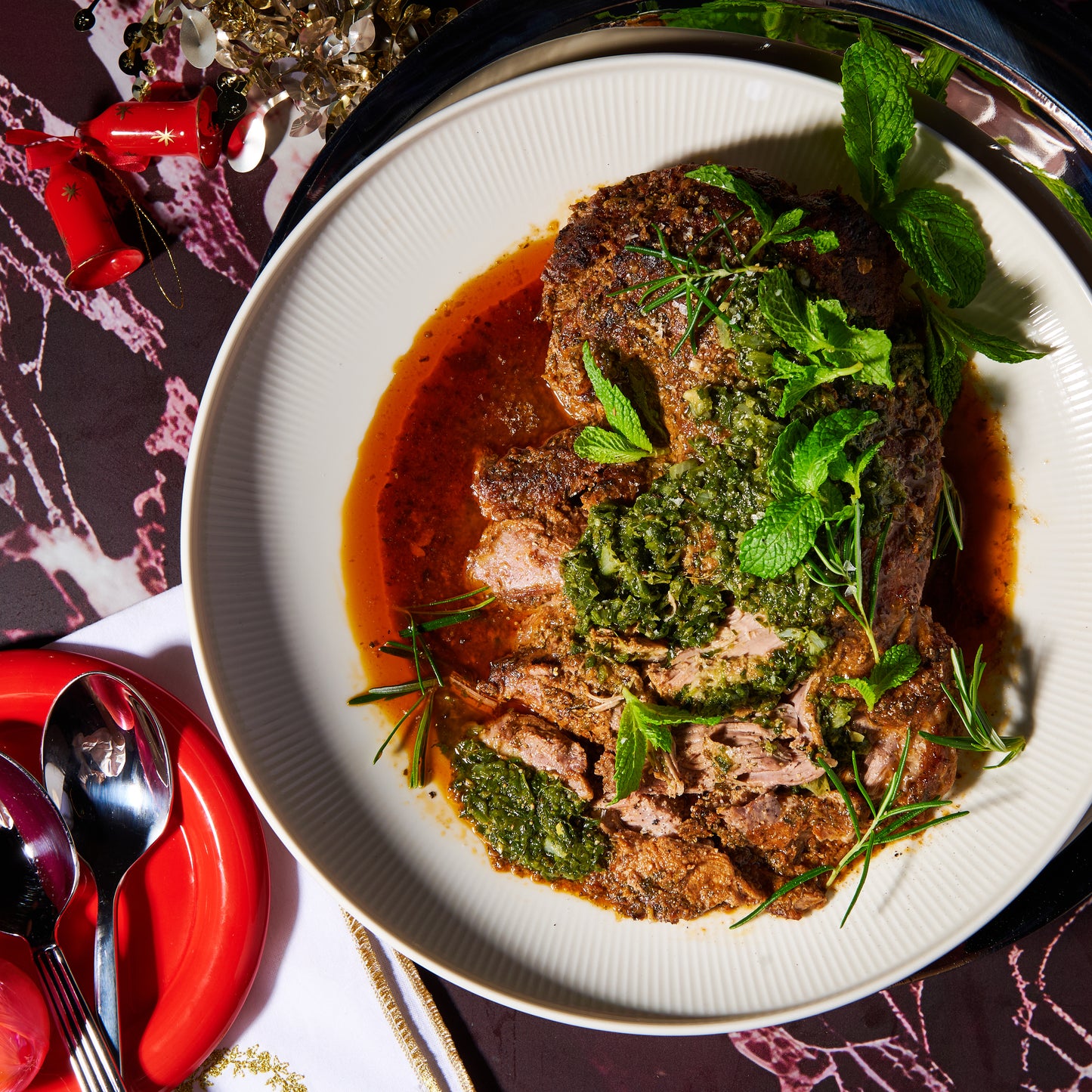 Herby slow-cooked boneless leg of lamb with mint salsa verde