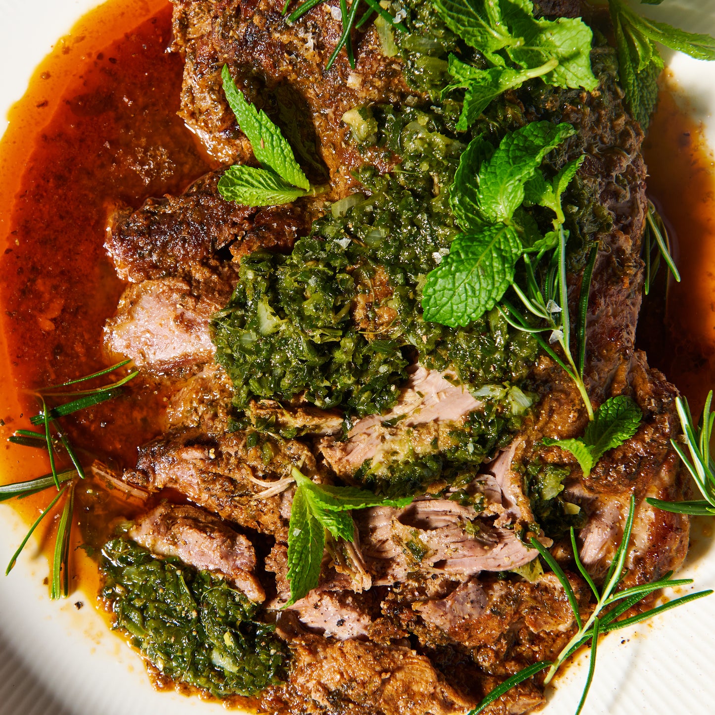 Herby slow-cooked boneless leg of lamb with mint salsa verde