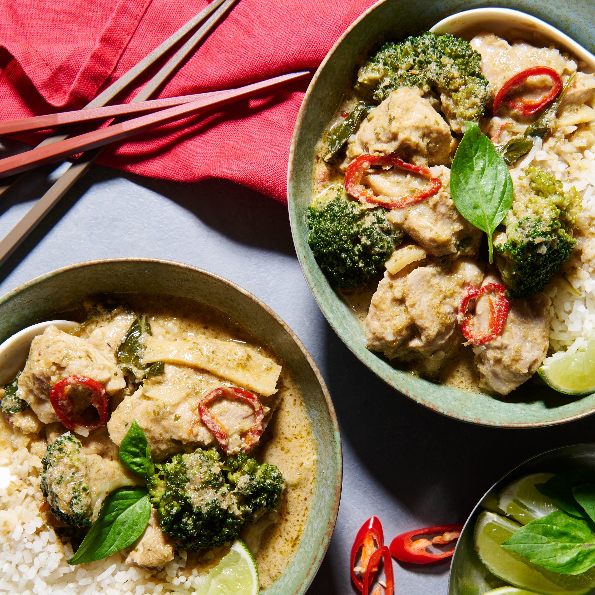 Thai green chicken curry in bowls 