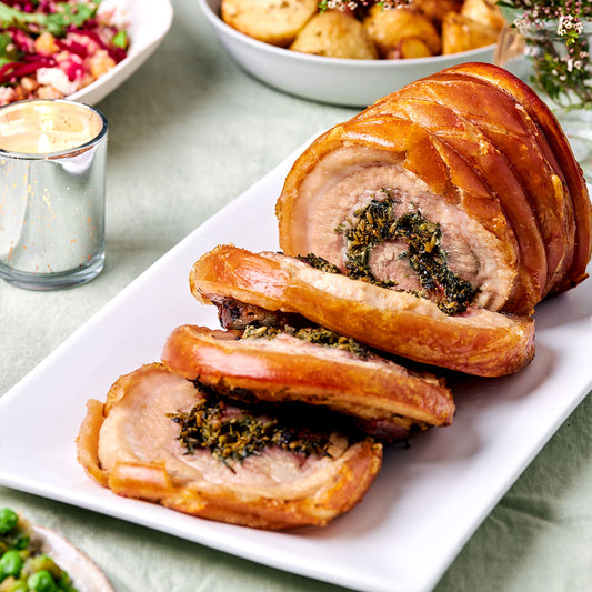 Porchetta- rolled pork belly with rosemary, sage and fennel
