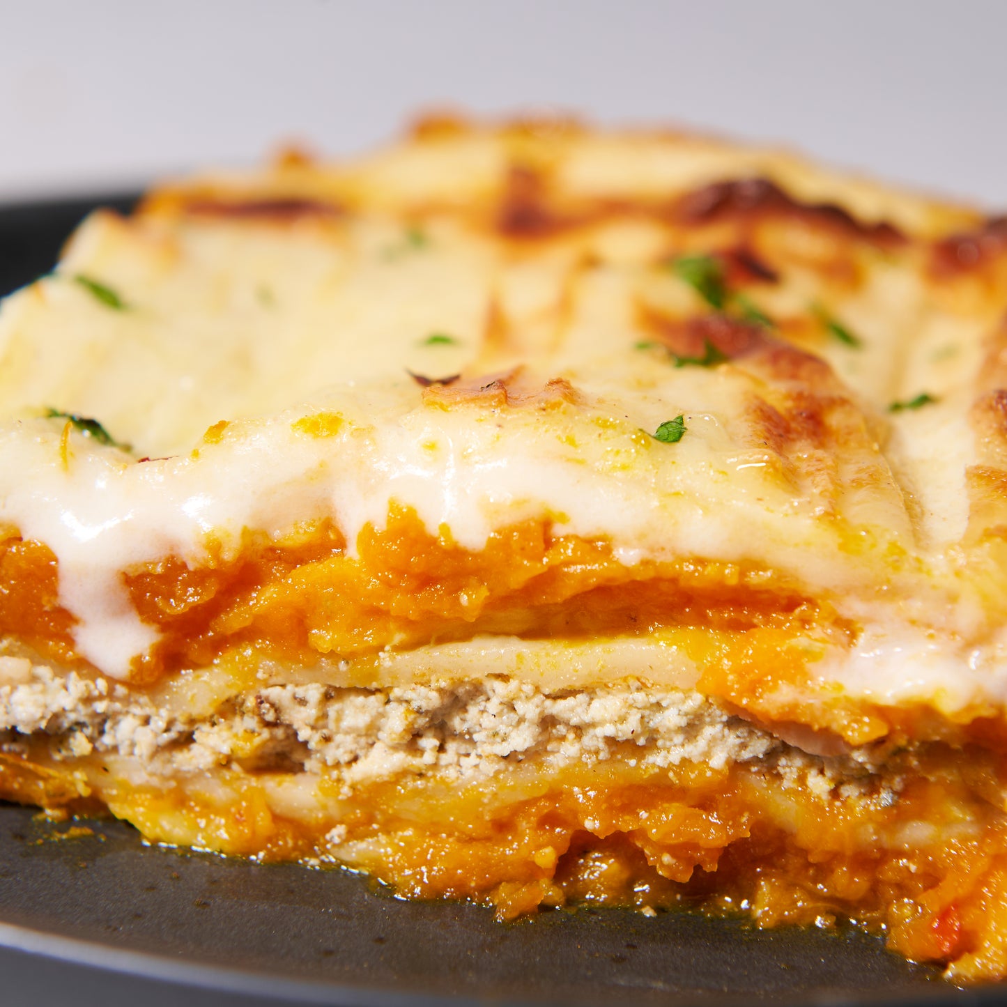 Roast pumpkin and ricotta lasagne with sage and walnuts