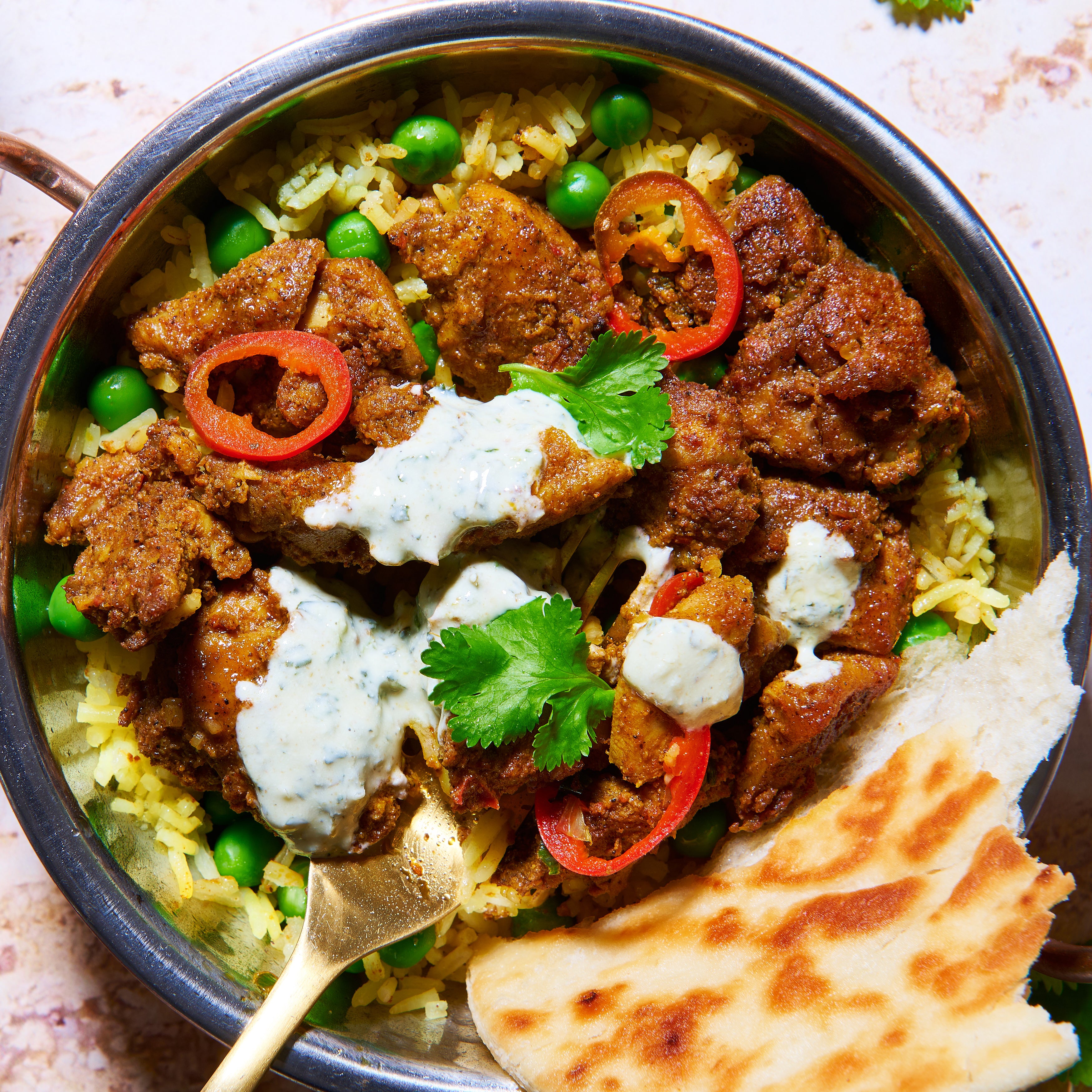 Tandoori chicken with saffron rice and naan bread